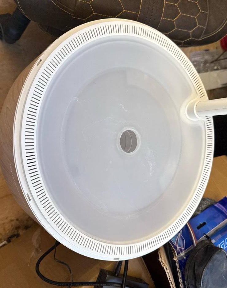 Disassembly step 1: remove top plate by lifting up and away from center post